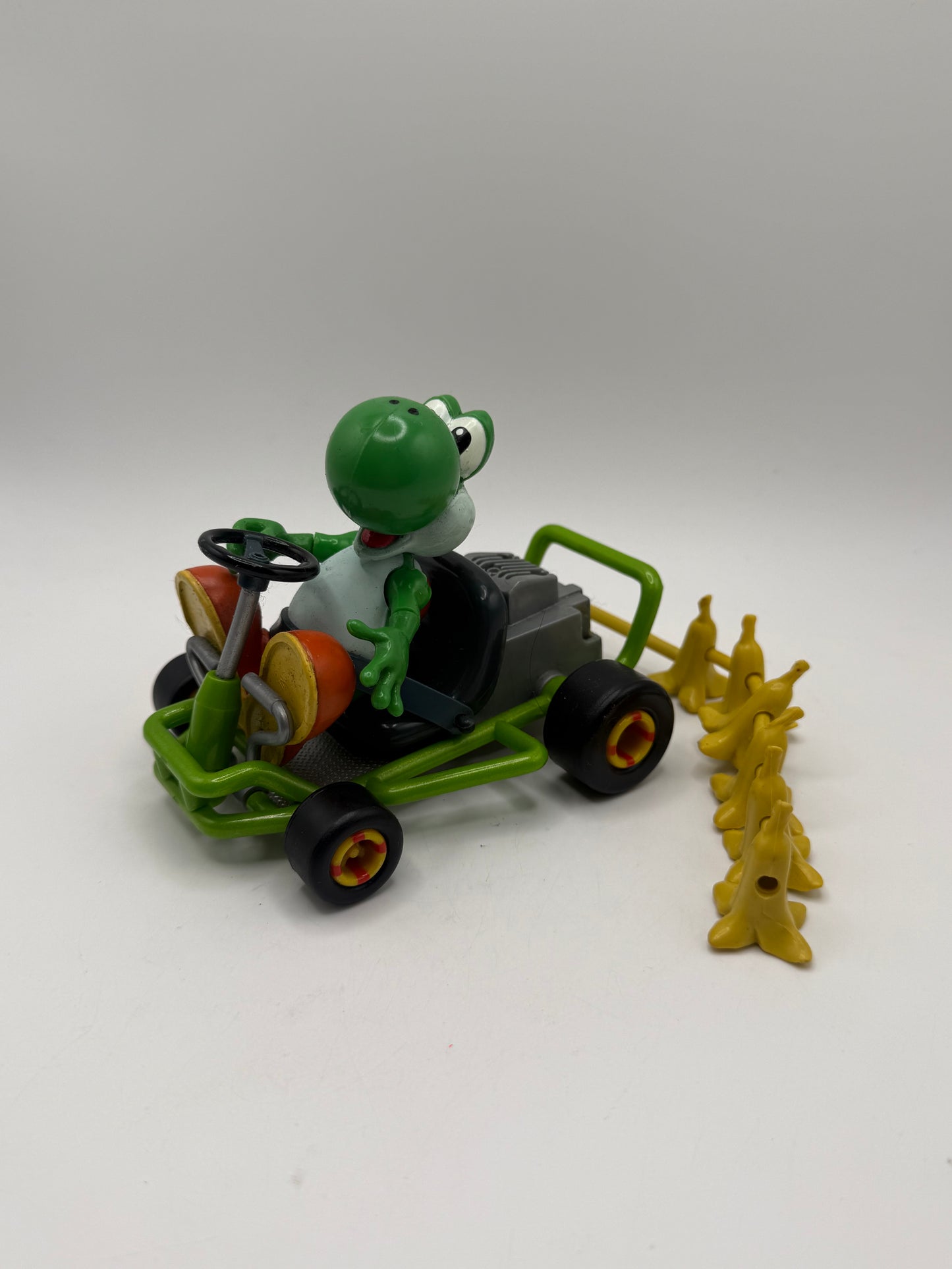 1999 Yoshi Nintendo Mario Cart with banana attachment