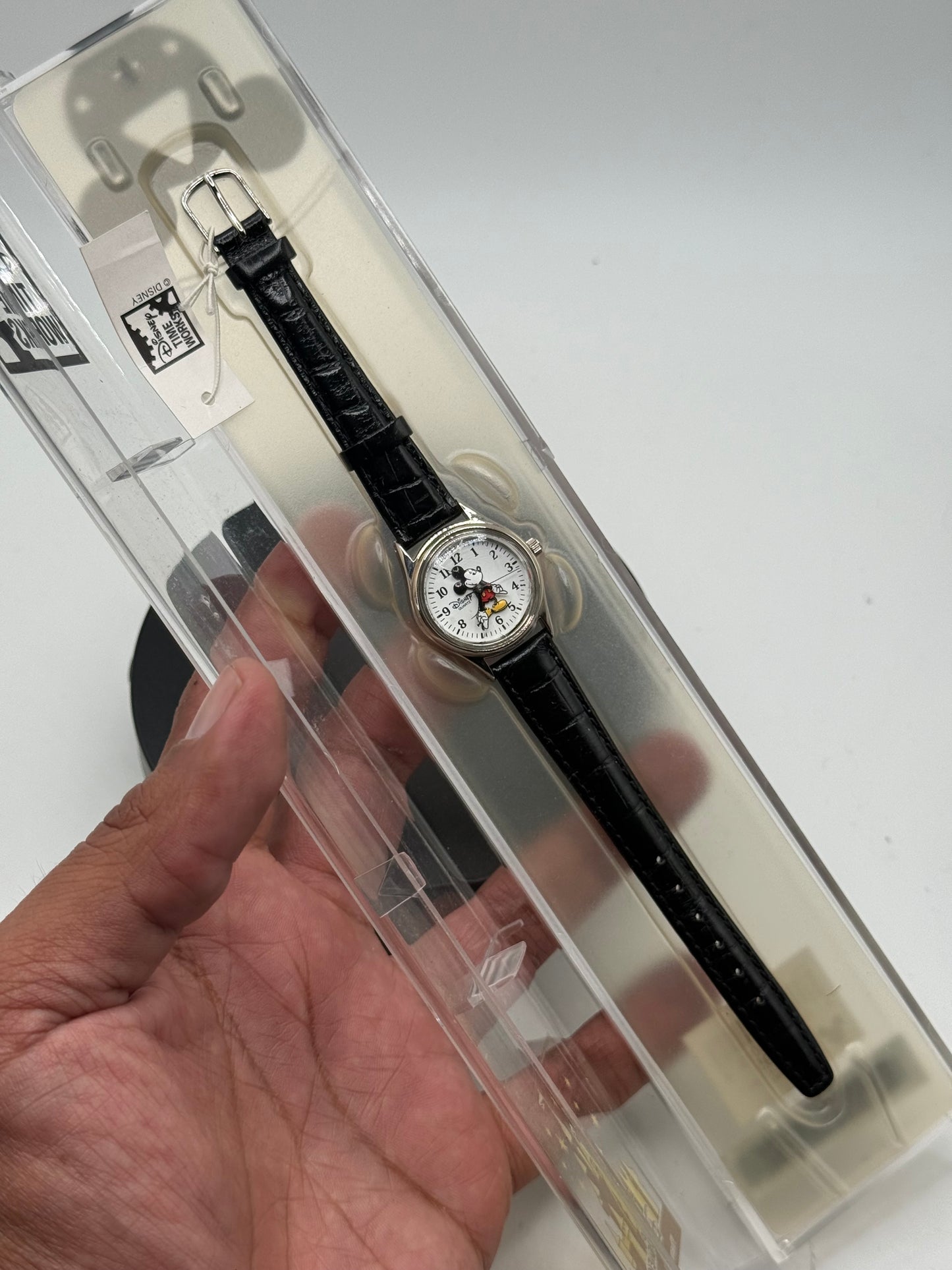Mickie mouse watch and sterling silver Virgin Mary pendant