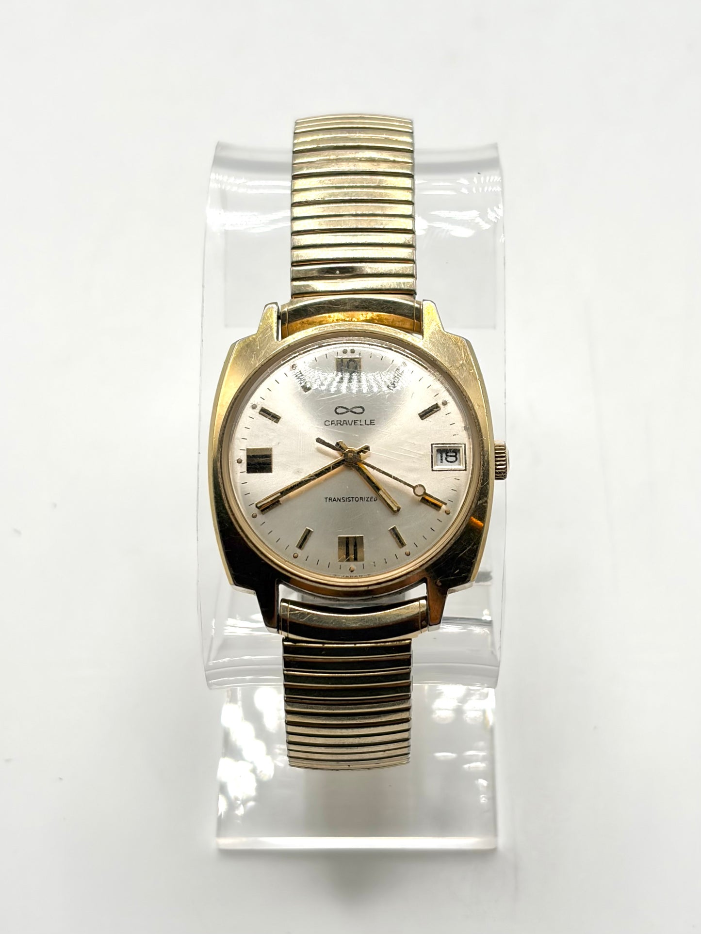 Caravelle Transistorized Gold Tone Date Men’s Wristwatch