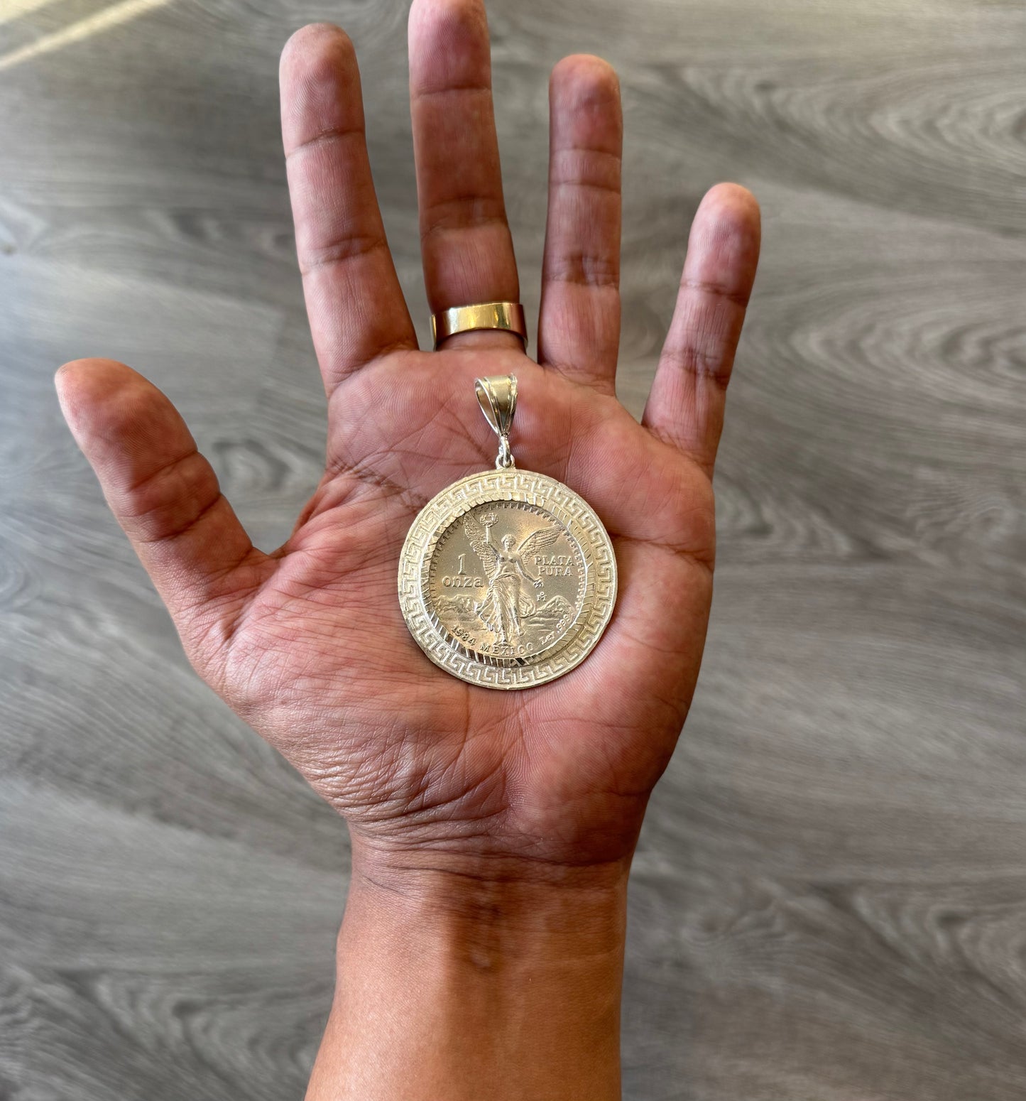 .999 Pure Silver Centenario coin and sterling aztec bezel