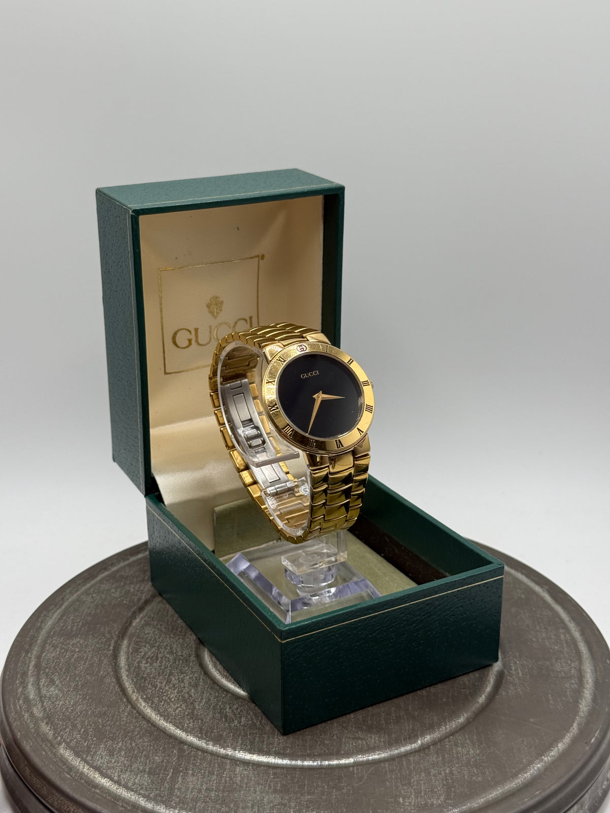 Gucci gold tone watch