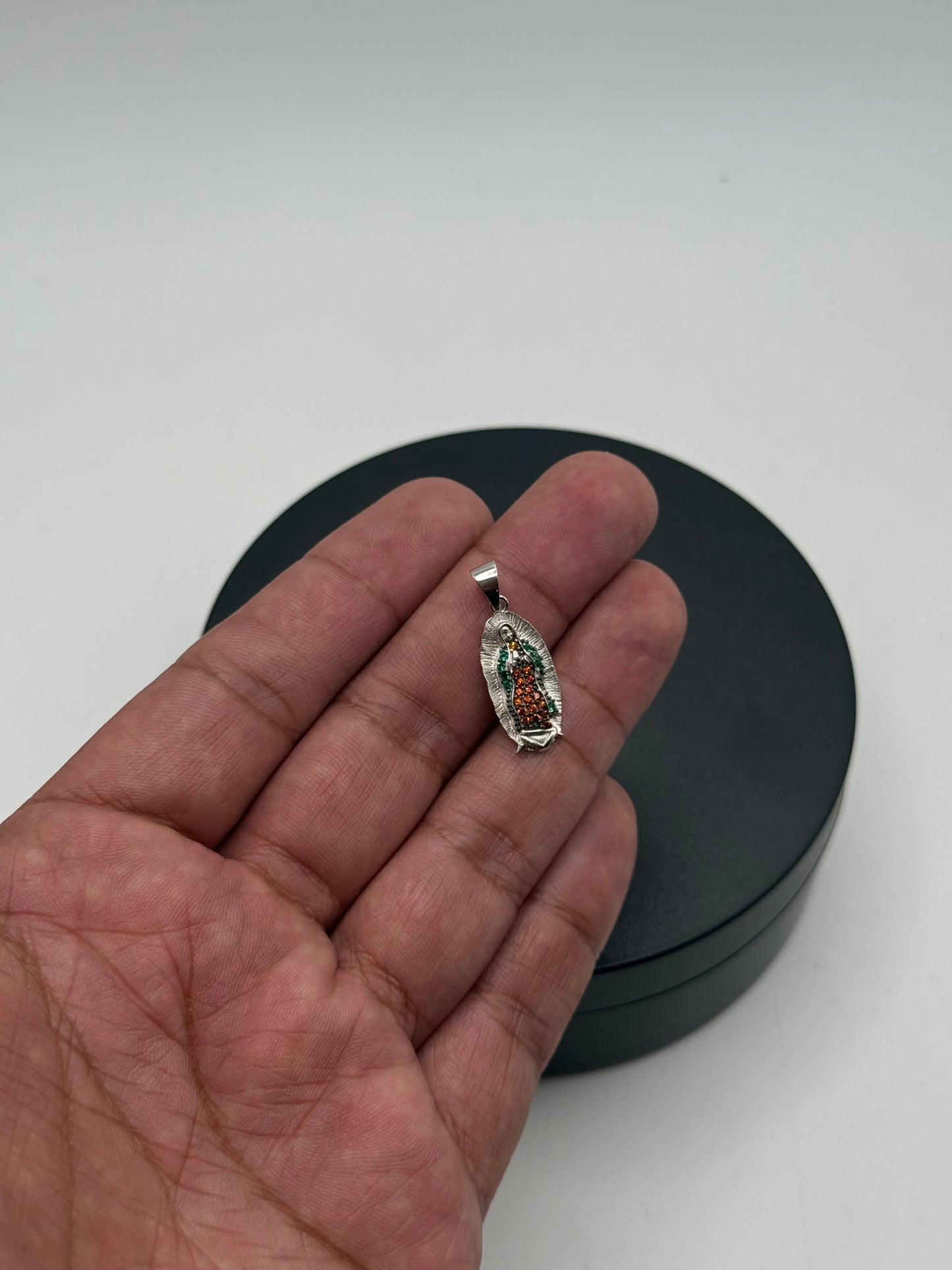 Mickie mouse watch and sterling silver Virgin Mary pendant