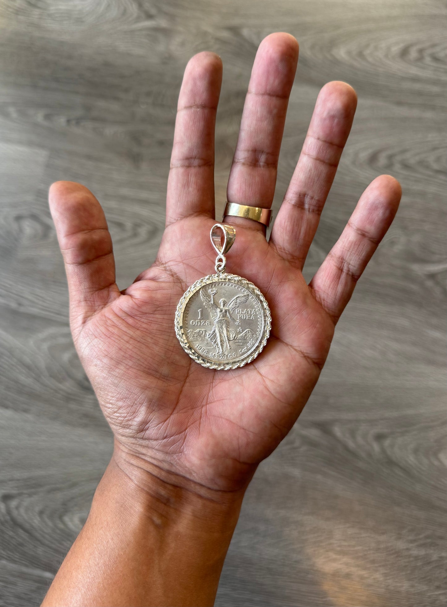 .999 Pure Silver Centenario coin and sterling bezel