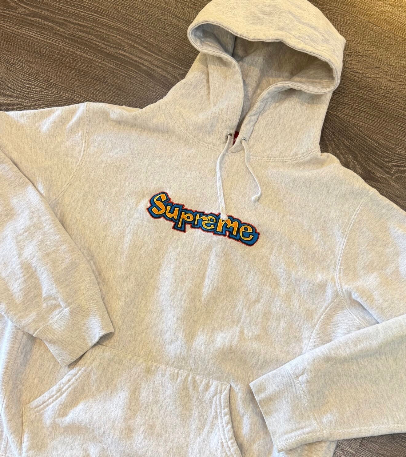 Nintendo Switch game and Supreme hoodie