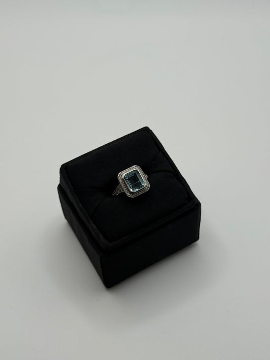 .925 Sterling Silver Emerald Cut Blue Topaz Halo Ring 8.5