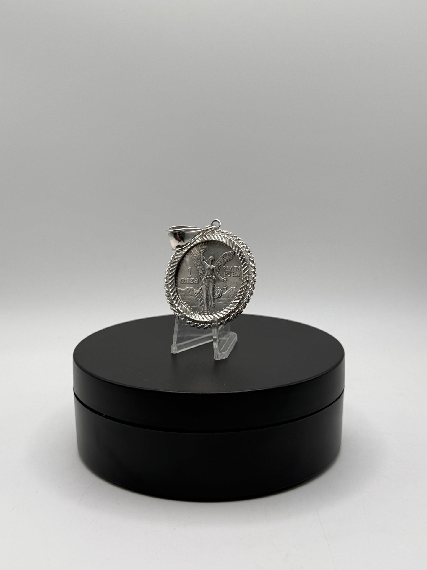 .999 Pure Silver Centenario with Sterling silver fluted rope bezel