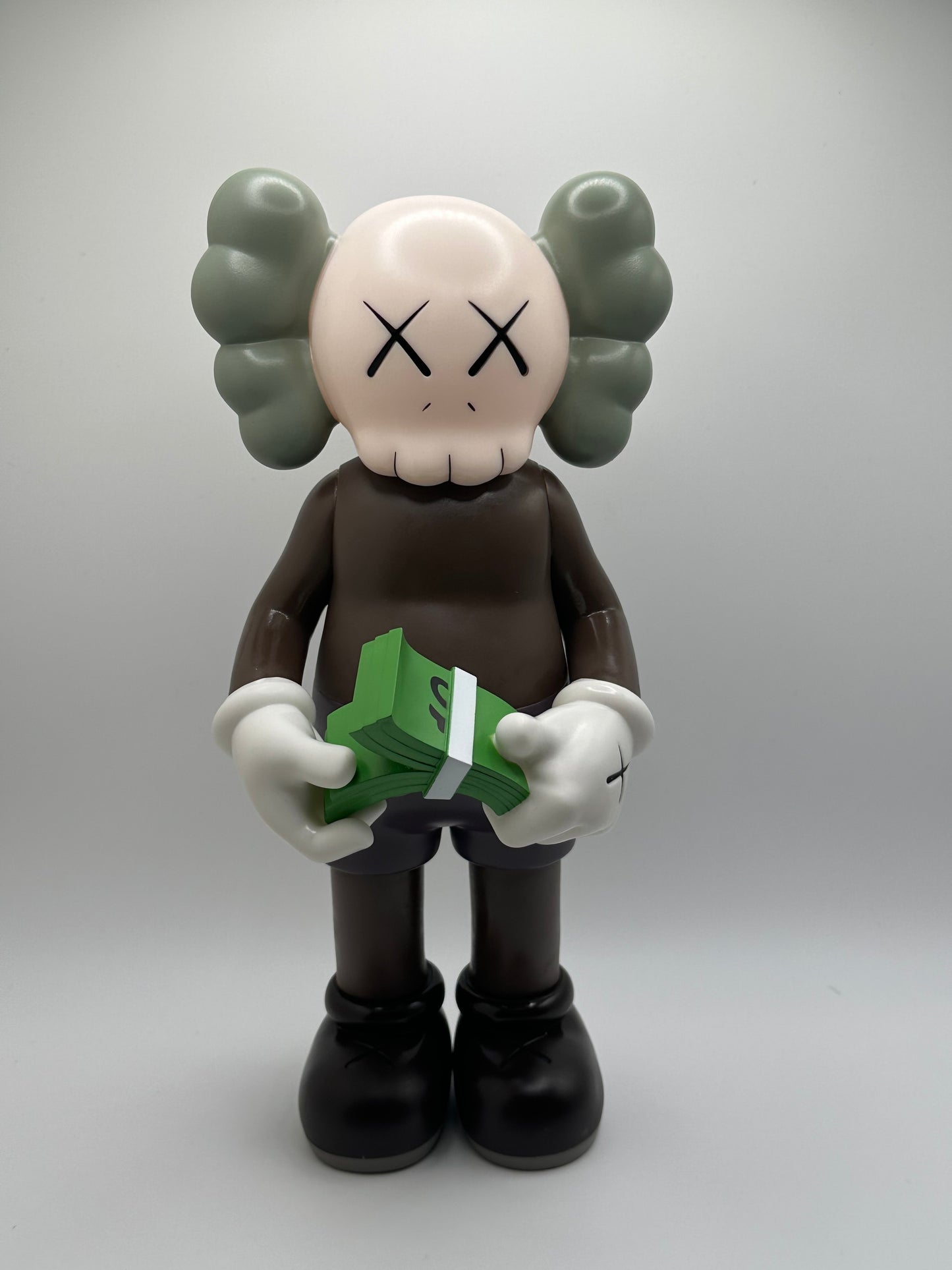 KAWS Companion Figure w/ Cash Stack – Vinyl Art Toy (Brown/Gray)