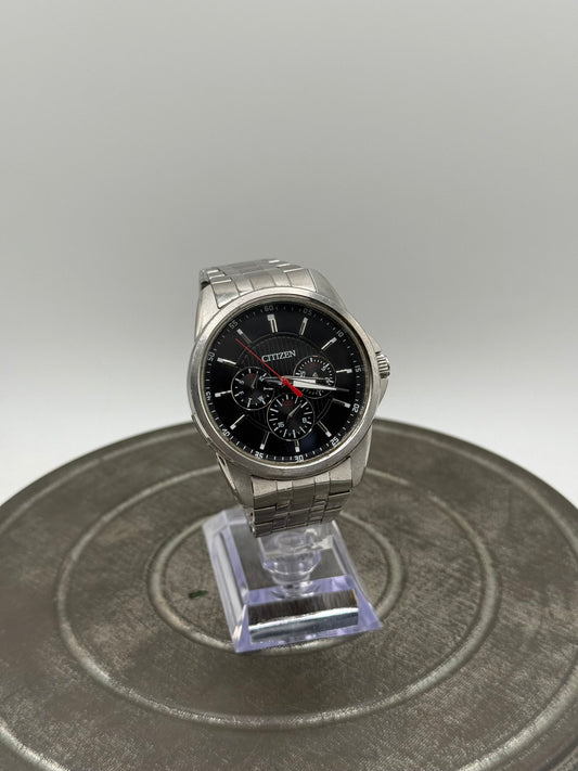 Citizen Multifunction Watch – Black Dial, Red Accents, Stainless Steel Bracelet, Three Subdials