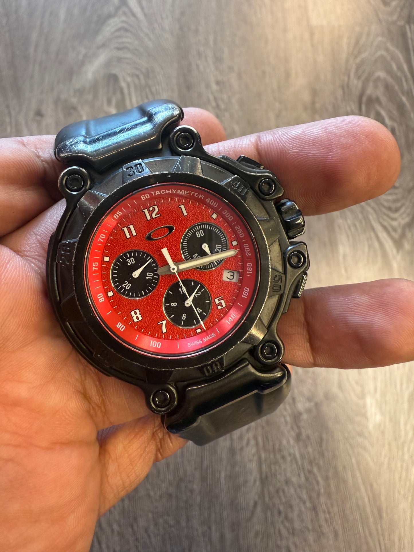 Red dial Oakley watch