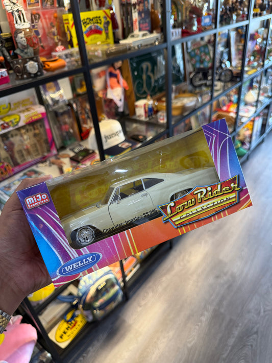Lowrider diecast car “1965 impala”