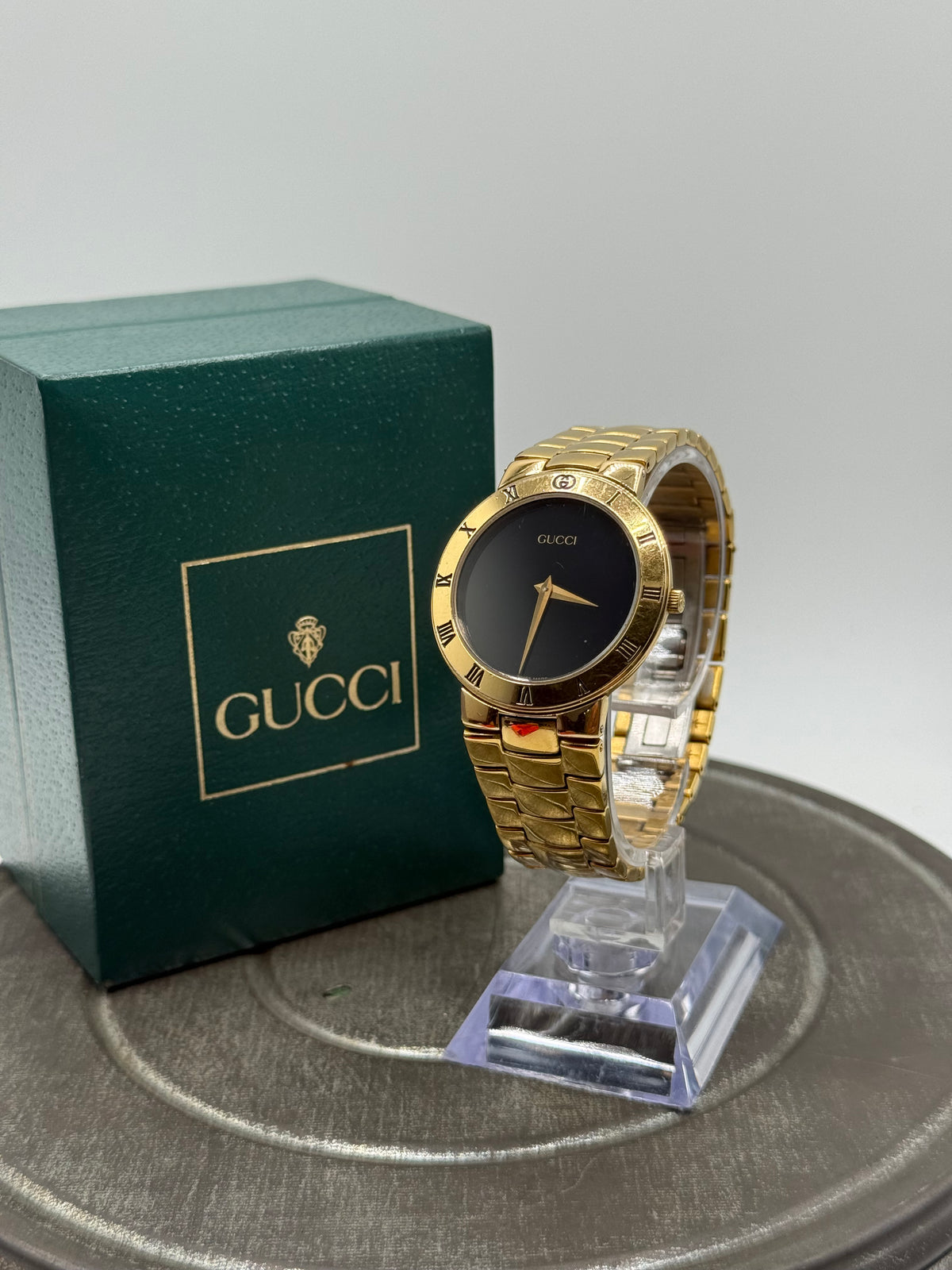Gucci gold tone watch