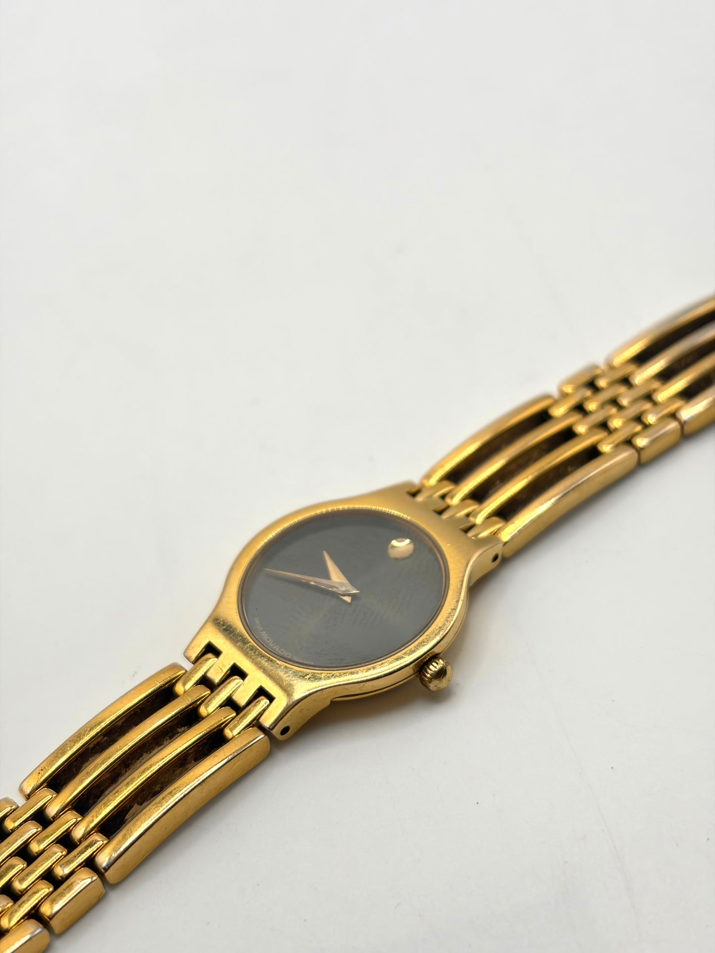 Movado gold tone watch